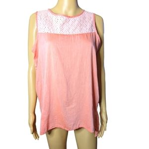 Peach high/low lightweight sleeveless summer top with white eyelet touch on top.